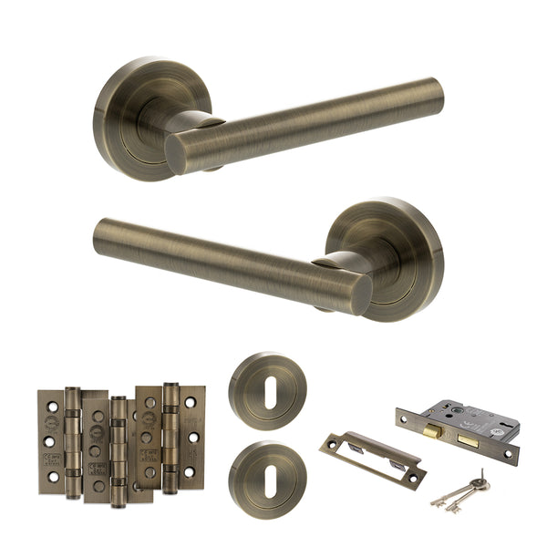 STATUS Nebraska Door Handle Pack (3 Lever Lock Set - 2.5" CE Sashlock, 3" Fire Rated Hinges x3) - Antique Brass - ADPS28RAB14