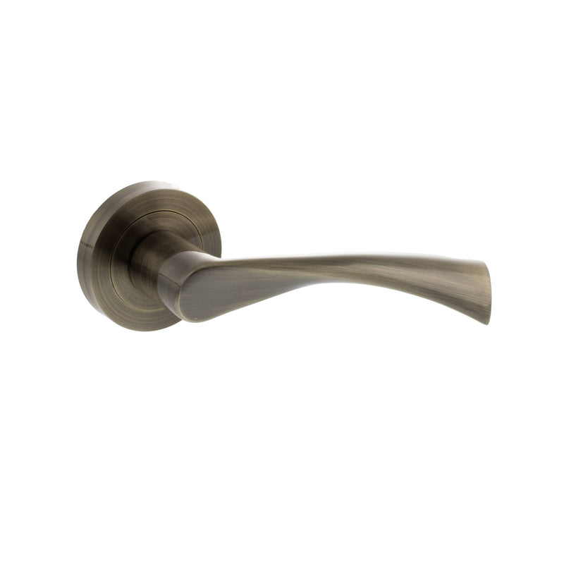 STATUS Colorado Lever Door Handle on Round Rose - Antique Brass - S34RAB