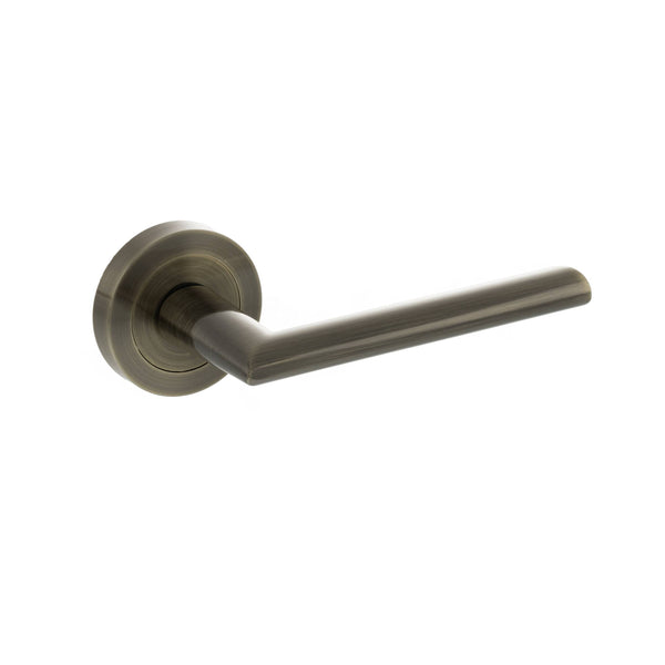 STATUS Alabama Lever Door Handle on Round Rose - Antique Brass - S43RAB