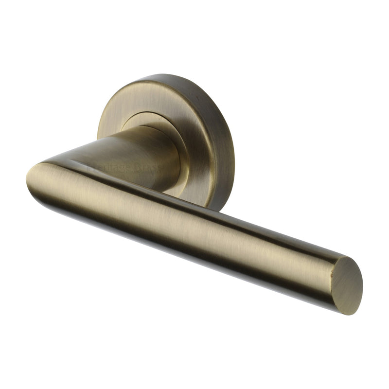 Heritage Brass Door Handle Lever Latch on Round Rose Mercury Design Antique Brass finish
 - V3262-AT - Choice Handles