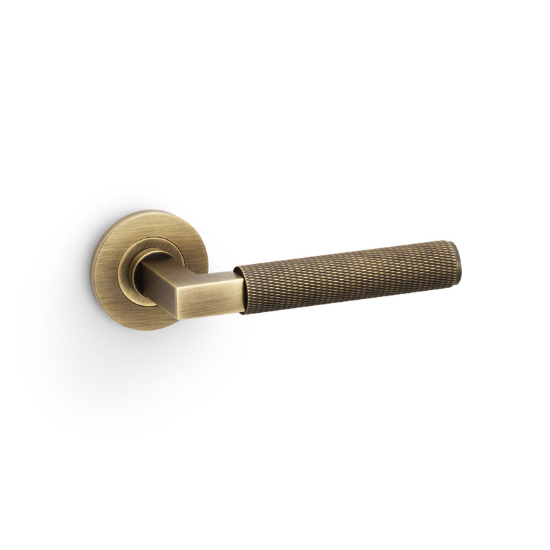 Alexander and Wilks - Hurricane Knurled Lever on Round Rose - Antique Brass - AW200AB