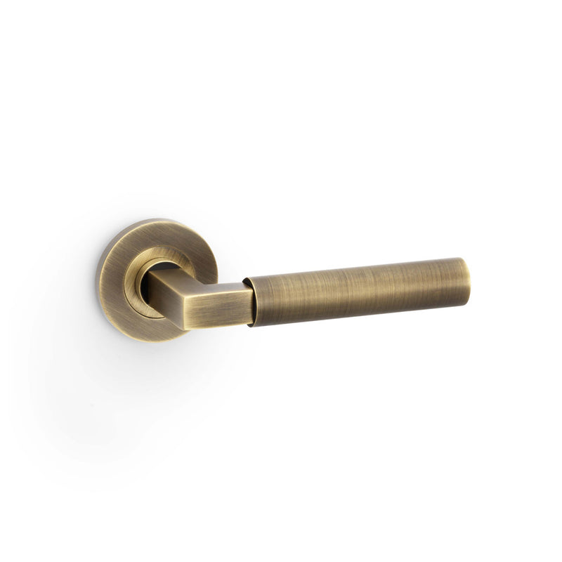 Alexander and Wilks - Hurricane Plain Lever on Round Rose - Antique Brass - AW201AB