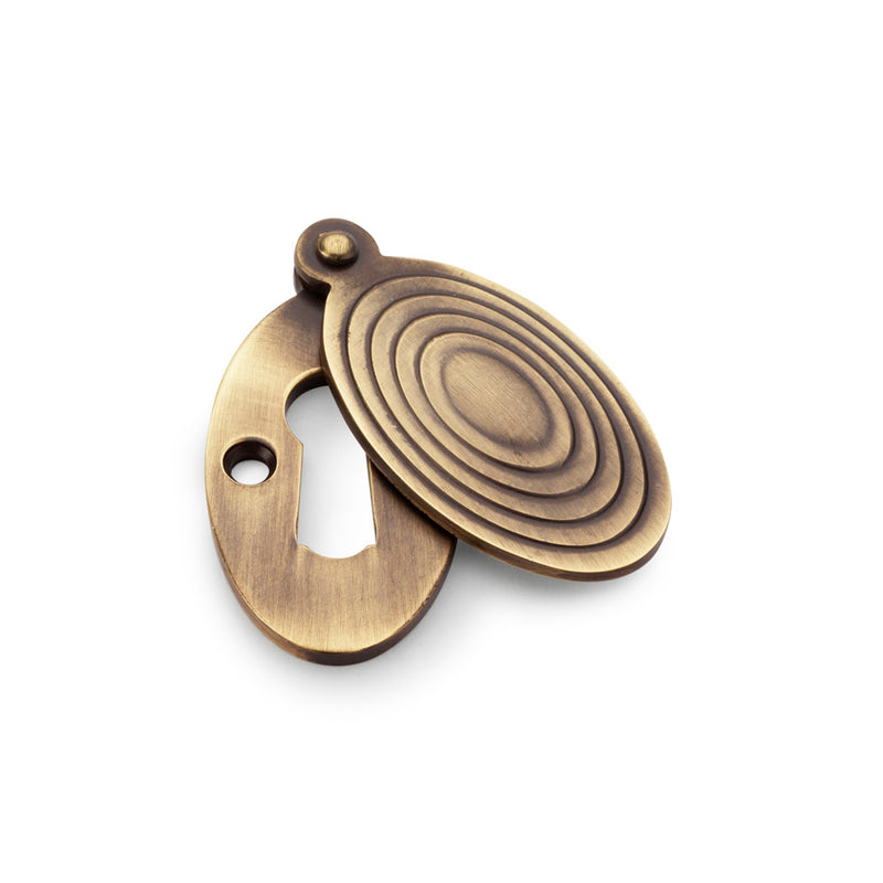 Alexander and Wilks - Standard Key Profile Ellipse Escutcheon with Christoph Design Cover - Antique Brass - AW385-AB