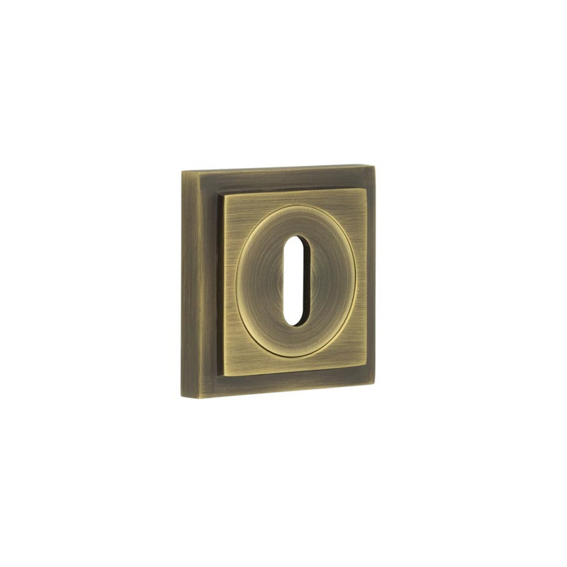 Burlington - Standard Keyway Escutcheons Square Stepped Rose - Antique Brass - BUR-60AB-173AB - Choice Handles