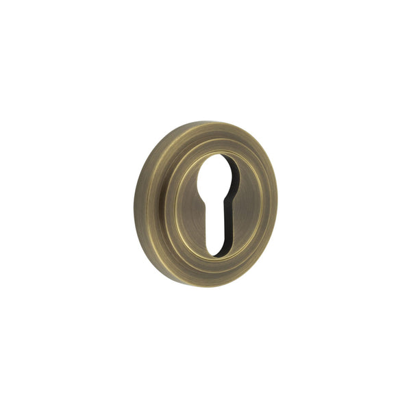 Burlington - Euro Profile Escutcheons Stepped Rose - Antique Brass - BUR-61AB-73AB - Choice Handles