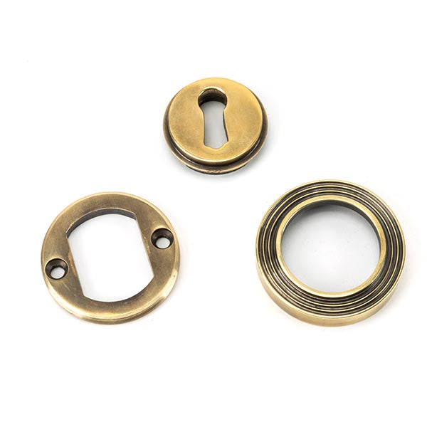 From The Anvil - Round Escutcheon (Beehive) - Aged Brass - 45685 - Choice Handles