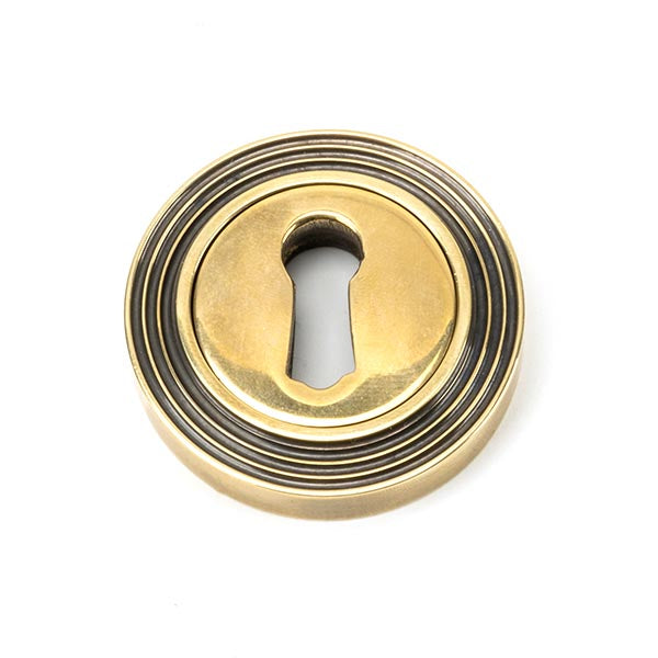 From The Anvil - Round Escutcheon (Beehive) - Aged Brass - 45685 - Choice Handles