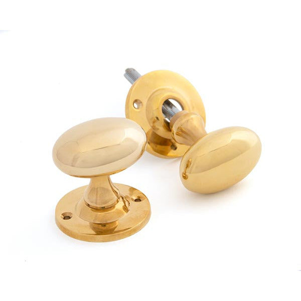 From The Anvil - Oval Mortice/Rim Knob Set - Polished Brass - 83627 - Choice Handles