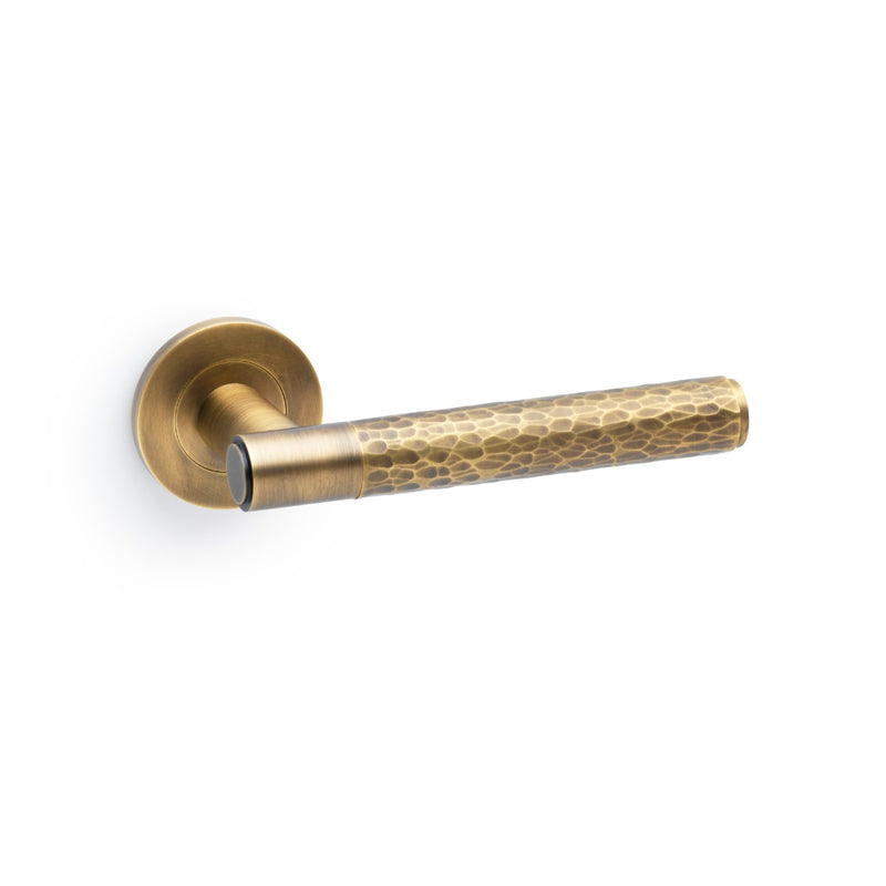 Alexander and Wilks - Spitfire Hammered Lever on Round Rose - Italian Brass - AW223IB - Choice Handles